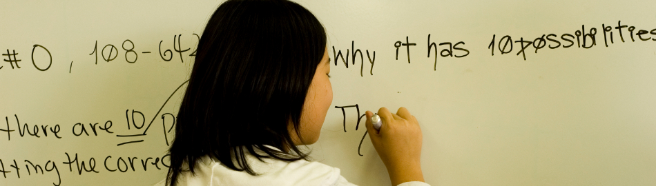 Image of student at white board